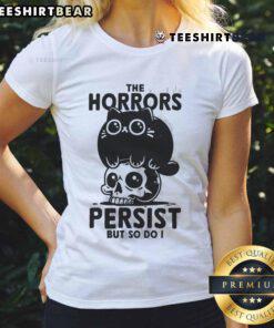 Alt Text: Cute cat graphic on 'The Horror Persist But So Do I' skull ladies tee shirt showcasing a stylish design.