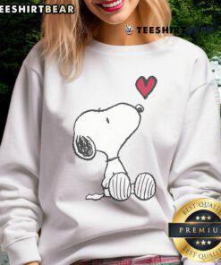 Cute Peanuts Snoopy heart sweatshirt featuring a colorful design of Snoopy with hearts, perfect for fans of the classic comic.