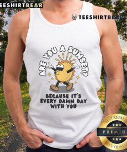 Alt Text: Funny tank top with a sunset graphic and the phrase 'Are you a sunset? Because it's every damn day with you'.