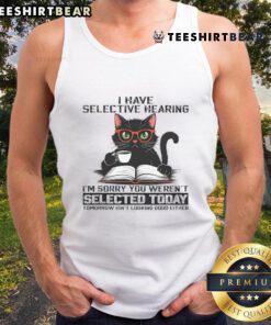 Cat wearing a tank top with 'I have selective hearing, you weren't selected' humor, perfect for cat lovers and funny apparel.