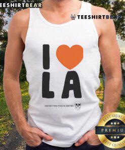 Funny I Love LA tank top featuring humorous text about city life challenges and love for Los Angeles.