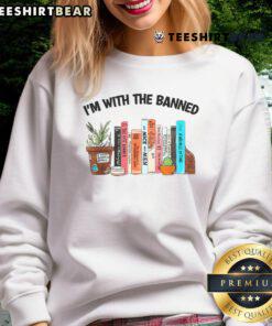 Funny 'I'm With The Banned Book Readers' sweatshirt showcasing support for banned books and reading culture.