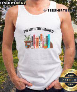Person wearing a 'I'm With The Banned Book Readers' tank top, promoting banned books awareness and free expression.
