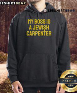 Funny hoodie featuring 'My Boss Is A Jewish Carpenter' design with a Christian cross, perfect for humorous faith-inspired fashion.