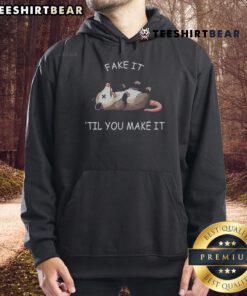 Funny opossum hoodie for animal lovers featuring 'Fake It Till You Make It' design, perfect for cozy casual wear.