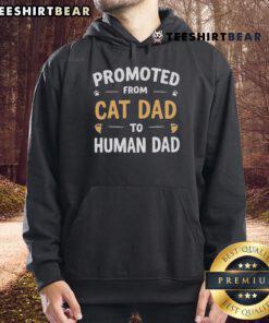 Funny 'Promoted from Cat Dad to Human Dad' hoodie design featuring playful graphics and text for proud pet parents.
