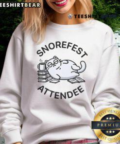 Attendee in a Funny Snorefest sweatshirt featuring a lazy cat design, showcasing comfort and humor at the event.