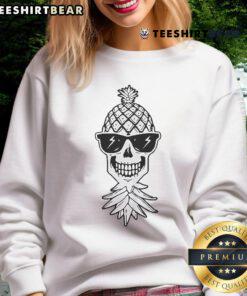 Funny upside-down swinger pineapple skeleton skull with sunglasses on a sweatshirt, perfect for quirky fashion lovers.