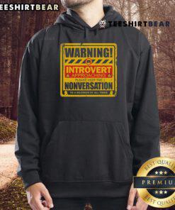 Alt Text: Funny Warning Introvert Approaching hoodie design with humorous text about avoiding small talk and nonversation.