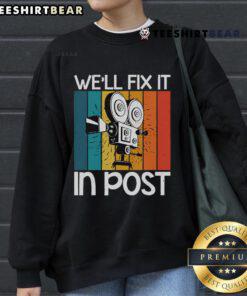 Alt Text: Retro camera sweatshirt featuring the funny slogan We'll Fix It In Post for photography enthusiasts and creatives.