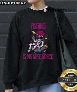 Good Fishing Is My Safe Space astronaut sweatshirt featuring a playful design for fishing enthusiasts and space lovers.