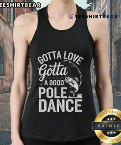 Fisherman in a tank top enjoying pole dance fishing, showcasing the fun and skill of angling with a big catch.
