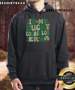 Good Groovy In Lucky School Counselor Era St. Patrick's Day Hoodie featuring vibrant green design and fun shamrock graphics.