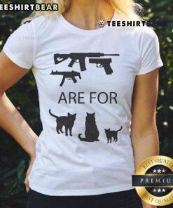 Good Guns Are For Pussies Anti-Gun Cat Ladies Tee featuring a playful cat graphic and bold text on a stylish shirt.