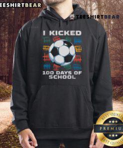 Boy wearing a 'Good I Kicked 100 Days of School' hoodie, celebrating soccer achievements in a vibrant schoolyard setting.