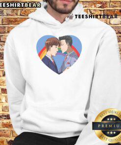 Alt Text: Couple wearing Hot Rainbow Heart LGBT Valentine's Day matching hoodies, celebrating love and pride.