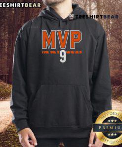 Joe Burrow in a Cincinnati Bengals hoodie celebrating his MVP win, showcasing NFL pride and team spirit.