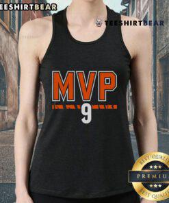 Joe Burrow in a Cincinnati Bengals tank top, celebrating his MVP status in NFL football, showcasing team pride.
