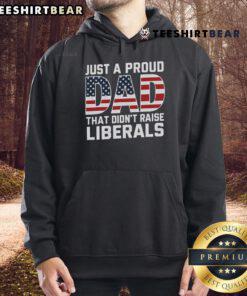 Proud dad wearing a patriotic liberals hoodie, showcasing vibrant colors and bold text in a casual setting.