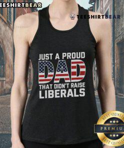 Alt Text: Proud dad wearing a patriotic tank top, expressing liberal values with a fun and stylish design.