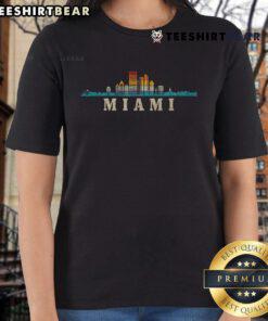 Vintage ladies tee featuring the Nice Miami skyline in Florida, showcasing vibrant cityscape and retro design.