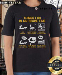Lady wearing a 'Nice Musher Things I Do In My Spare Time' tee, enjoying dog sledding and mushing outdoors.