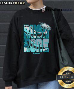 Cozy Philadelphia Eagles NFL Rush Zone sweatshirt featuring team colors and logo, perfect for fans on game day.