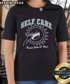 Women in a serene setting wearing 'Nice Self Care Resort State of Mind' tee, embracing relaxation and self-care.
