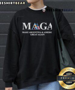 Official MAGA Make Argentina America Great Again sweatshirt in bold red with white lettering on a casual backdrop.