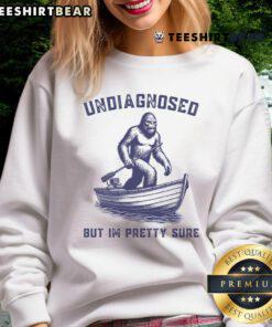 Official Undiagnosed But I'm Pretty Sure Bigfoot Sweatshirt featuring a fun Bigfoot graphic, perfect for casual wear.
