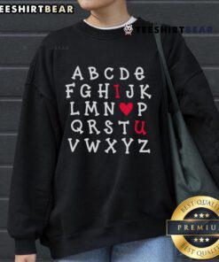 Premium English Teacher sweatshirt featuring 'I Love You' alphabet design, perfect for educators and language lovers.