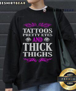 Premium Tattoos Pretty Eyes and Thick Thighs tattoo sweatshirt featuring a stylish design and comfortable fit.