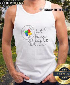 Pretty Autism Awareness tank top featuring a colorful puzzle design and 'Let Your Light Shine' slogan.
