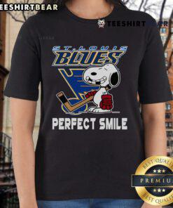 St. Louis Blues Snoopy tee featuring a perfect smile, ideal for ladies who love hockey and The Peanuts Movie.