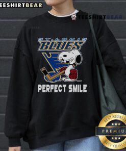 Alt Text: St. Louis Blues Snoopy sweatshirt features a perfect smile, blending NHL style with Peanuts movie charm.