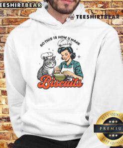 Top Retro Cat Biscuit hoodie featuring playful cat graphics and a fun slogan about making biscuits.