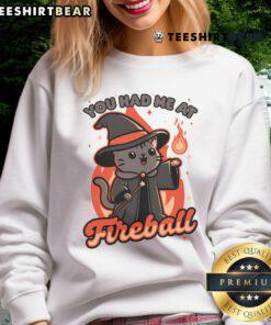 Cute cat sweatshirt featuring a magical fireball design, perfect for cat lovers and cozy fashion enthusiasts.