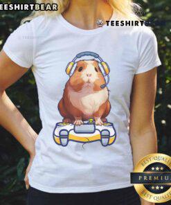 Cute guinea pig gamer in a cozy gaming setup, perfect for gamers and animal lovers on a fluffy cavy tee.