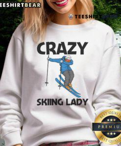 Funny crazy skiing lady sweatshirt design featuring a playful skier in vibrant colors, perfect for winter sports enthusiasts.