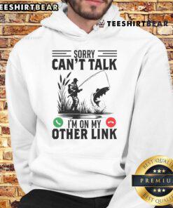Funny 'Sorry, Can't Talk, I'm On My Other Line' Fishing Hoodie with humorous design for fishing enthusiasts.