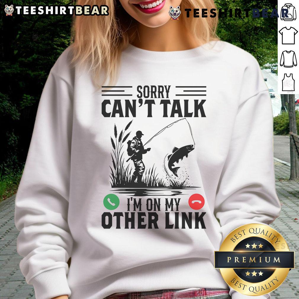 Funny 'Sorry Can't Talk, I'm On My Other Line' fishing sweatshirt design featuring a comical fishing theme.