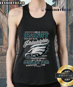 Fan wearing a tank top with 'I May Not Be in Philadelphia Eagles But I'm an Eagles Fan' design, showcasing team spirit.