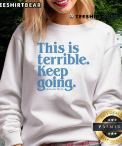 Alt Text: Good My Favorite Murder This Is Terrible Keep Going Sweatshirt featuring bold text design on a cozy hoodie.
