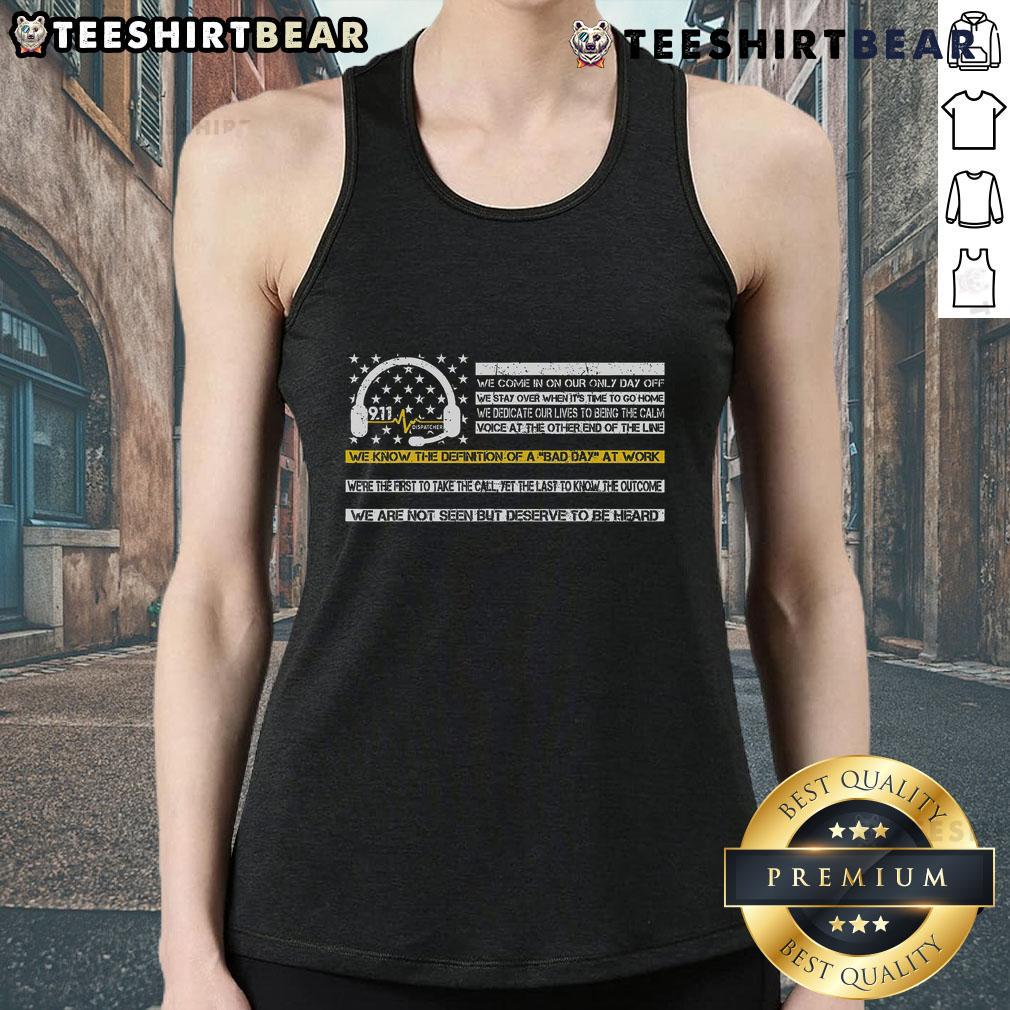 Female dispatcher wearing 'Good-Not-Seen-But-Deserve-To-Be-Heard' tank top, showcasing pride in 911 emergency services.