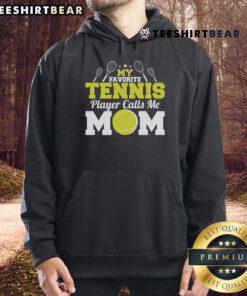 Mom wearing a 'My Favorite Tennis Player Calls Me Mom' hoodie, celebrating Mother's Day with a joyful smile.