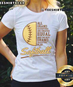 Happy grandparent cheering at a softball game, proudly supporting their granddaughter playing softball in a ladies' tee.