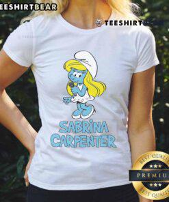 Sabrina Carpenter wearing a stylish Smurfs ladies tee, showcasing vibrant colors and a trendy design.