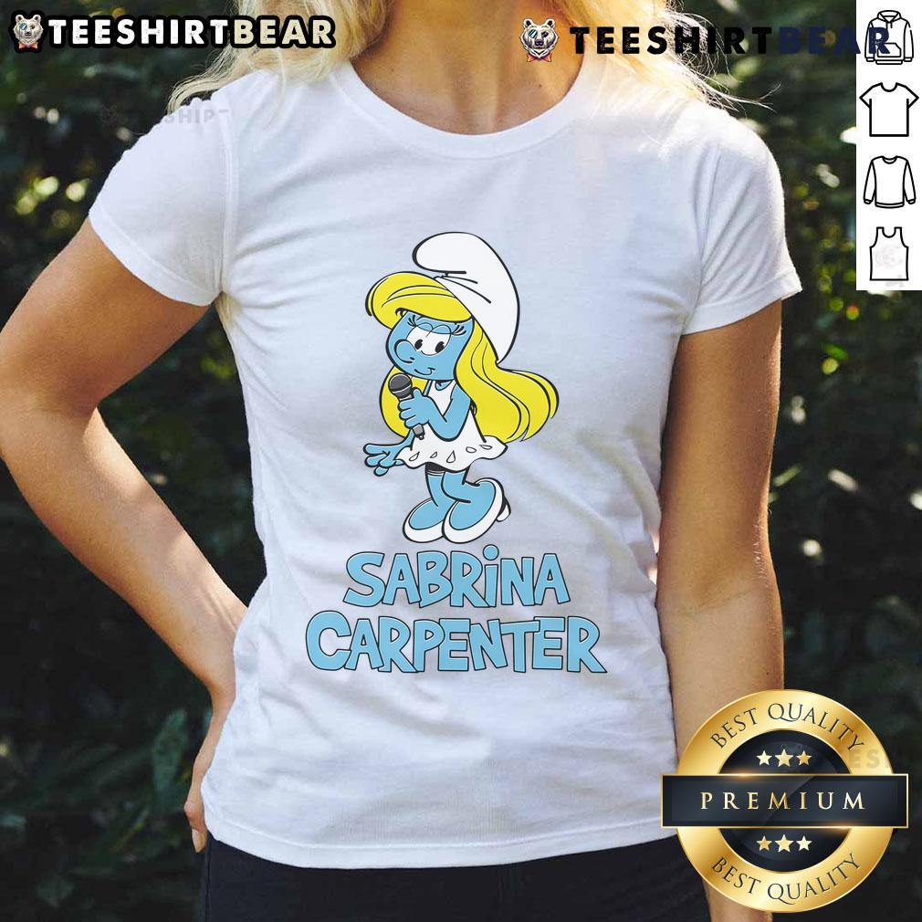 Sabrina Carpenter wearing a stylish Smurfs ladies tee, showcasing vibrant colors and a trendy design.