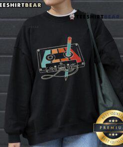 Retro sweatshirt featuring a colorful 80s 90s cassette and pencil design, perfect for nostalgic fashion lovers.