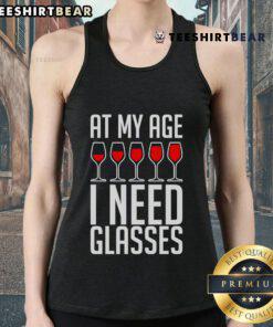 Stylish tank top reading 'Nice At My Age I Need A Glass of Wine', perfect for wine lovers and casual outings.